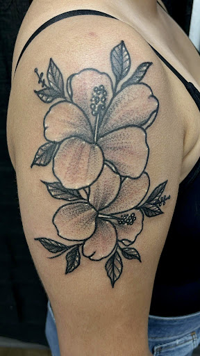Explore mother and daughter matching tattoos ideas, creative tattoo ideas in Shelbyville, available at Stage Left Tattoo and Piercing