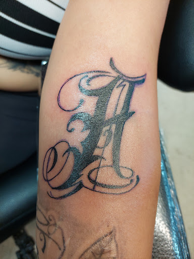 Explore upper back tattoo cover up ideas, creative tattoo ideas in Fort Mohave, available at RedRum Tattoo & Body Piercing Co.