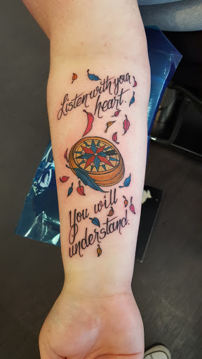 Explore hitchhiker's guide to the galaxy tattoo ideas, creative tattoo ideas in Carmel, available at Indiana Tattoo Company