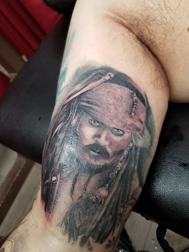 Find tattoo ideas for zodiac signs for your next unique tattoo in Somerdale at Royal Ink