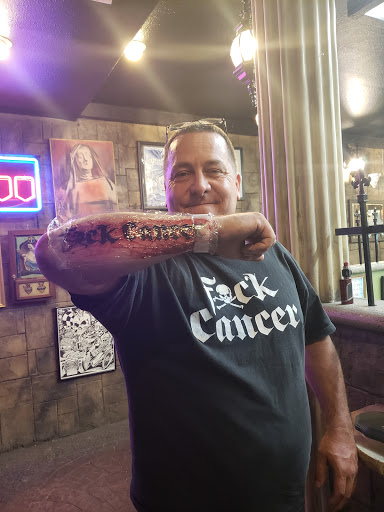 Explore ryuk tattoo ideas, creative tattoo ideas in Garden Grove, available at Saints & Sinners Tattoo