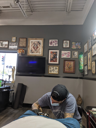 Find wild west tattoo ideas for your next unique tattoo in Dekalb at Proton Tattoo