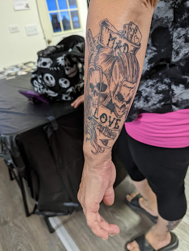 Explore mens upper arm tattoo ideas, creative tattoo ideas in Cadillac, available at Warchief Tattoo, LLC