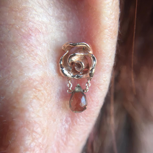 Explore tattoo sleeve ideas lion, creative tattoo ideas in Aurora, available at Bespoke Piercing & Jewelry (Inside Bonaroo Tattoo)