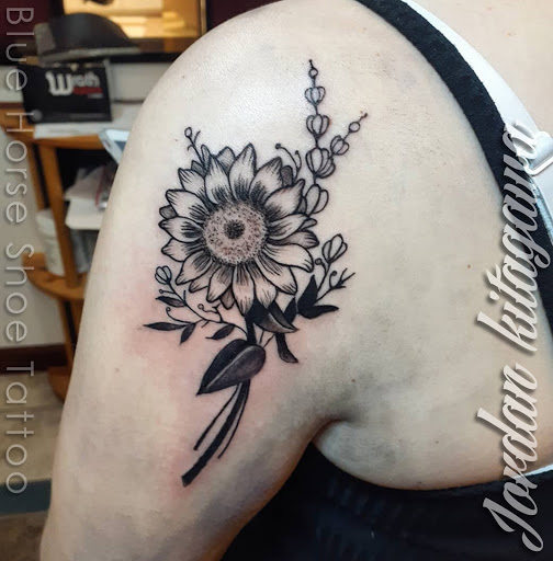 Explore hummingbird tattoo ideas, creative tattoo ideas in Portsmouth, available at World Famous Blue Horseshoe Tattoo and Piercing