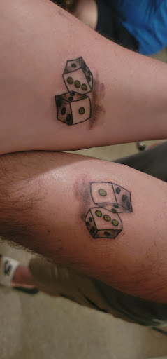 Explore fill in tattoo ideas for guys, creative tattoo ideas in Athens, available at Electric Zombie Tattoo And Piercing