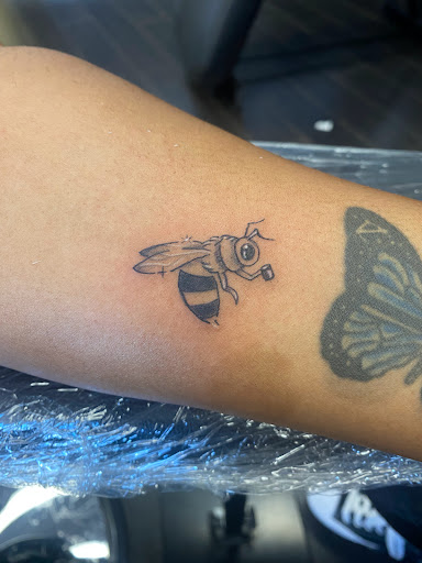 Explore puppy tattoo ideas, creative tattoo ideas in Roseville, available at Sacred Arrow Studio