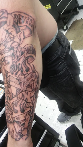 Find tattoo necklace ideas for your next unique tattoo in Philadelphia at J Rs Tattoo & Body Piercing