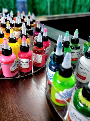 Explore small fill in tattoo ideas, creative tattoo ideas in Benton, available at Spectrum Tattoo