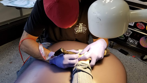 Tattoo Shop «Almighty Tattoo ( Under new ownership now Loyalty Tattoo Company!!!!)», reviews and photos, 5337 S Dort Hwy, Flint, MI 48507, USA