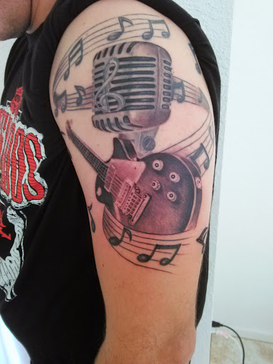 Explore tattoo ideas hand, creative tattoo ideas in Kissimmee, available at Precision Ink Tattoo Company