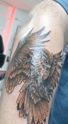 Explore gear tattoo ideas, creative tattoo ideas in Grand Rapids, available at Screaming Needle Tattoo & Body Piercing Studios