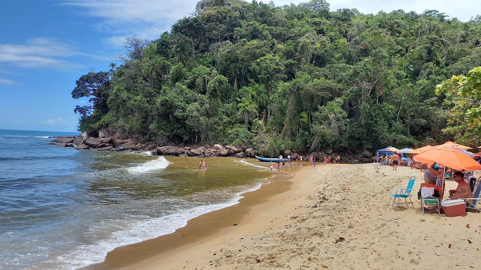 Photo of Prumirim Beach surrounded by mountains