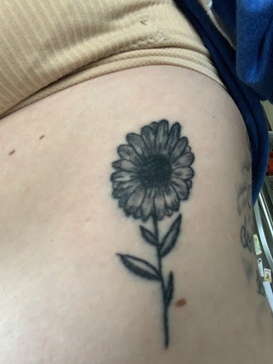 Explore august birth flower tattoo ideas, creative tattoo ideas in Morrisville, available at Sinners Circle tattoo co.