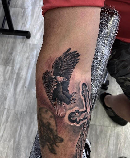 Explore rose tattoo ideas men, creative tattoo ideas in Ambler, available at Tattoo GalaxyAmbler Piercing & Custom Tattoos