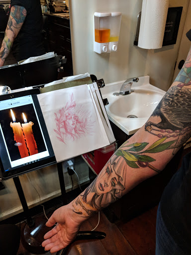 Explore tattoo ideas behind the ear, creative tattoo ideas in San Diego, available at Eden Tattoo Gallery