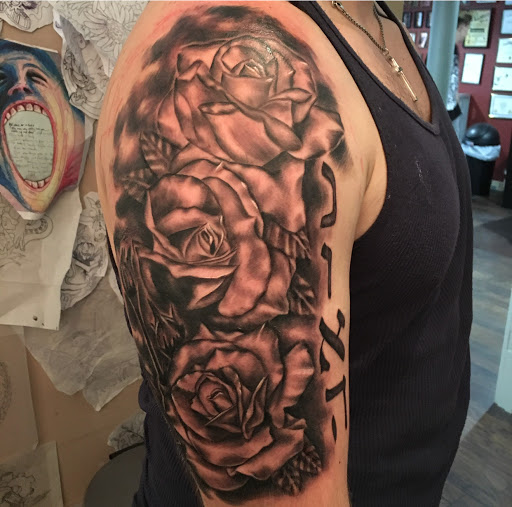 Explore cover up tattoo ideas on chest, creative tattoo ideas in Kingsford, available at Deft Tattoo Studio
