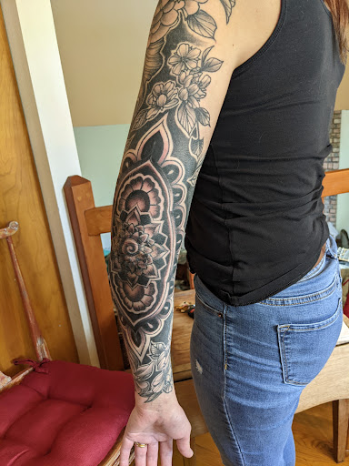 Explore tattoo ideas for the back of the neck, creative tattoo ideas in Bellingham, available at Old School Tattoo and Piercing