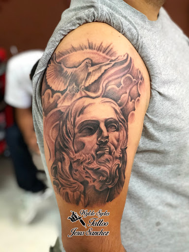 Explore bird tattoo ideas for men, creative tattoo ideas in San Diego, available at Wylde Sydes Tattoo & Body Piercing