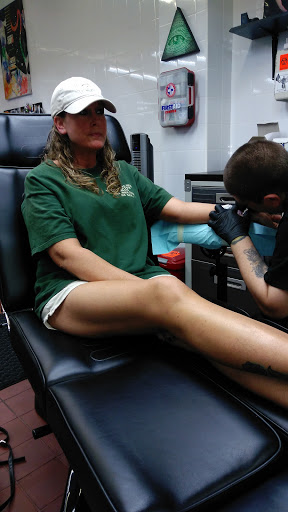 Explore checkered flag tattoo ideas, creative tattoo ideas in Saint Petersburg, available at Lucky You Tattoo