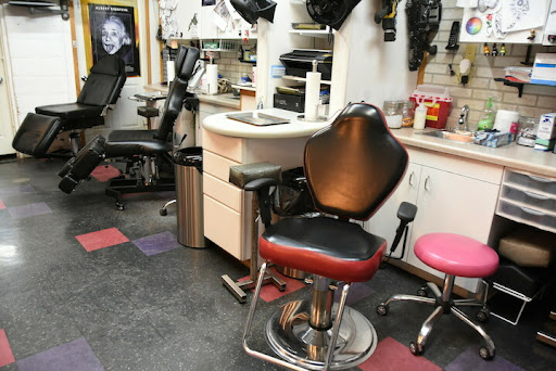 Explore world traveler tattoo ideas, creative tattoo ideas in Fond Du Lac, available at In Your Face Tattooz LLC