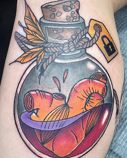 Explore waterfowl tattoo ideas, creative tattoo ideas in Clive, available at Wild Rose Tattoo & Piercing