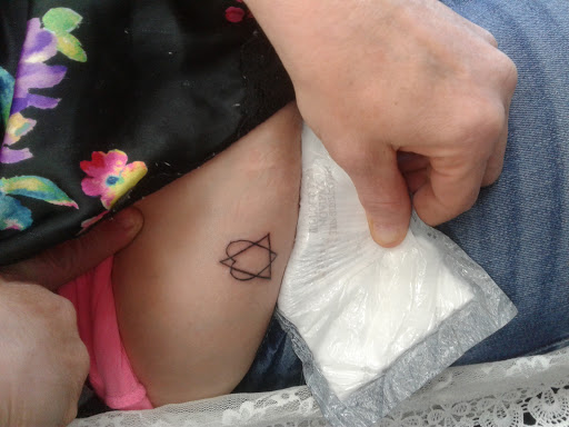 Explore tattoo ideas on lower stomach, creative tattoo ideas in Pelham, available at Skin Worx Inc