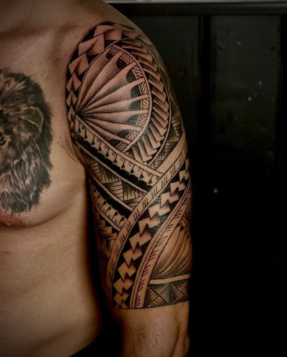 Explore blacked out tattoo ideas, creative tattoo ideas in Costa Mesa, available at Cleopatra INK Tattoo & Piercing shop Orange County