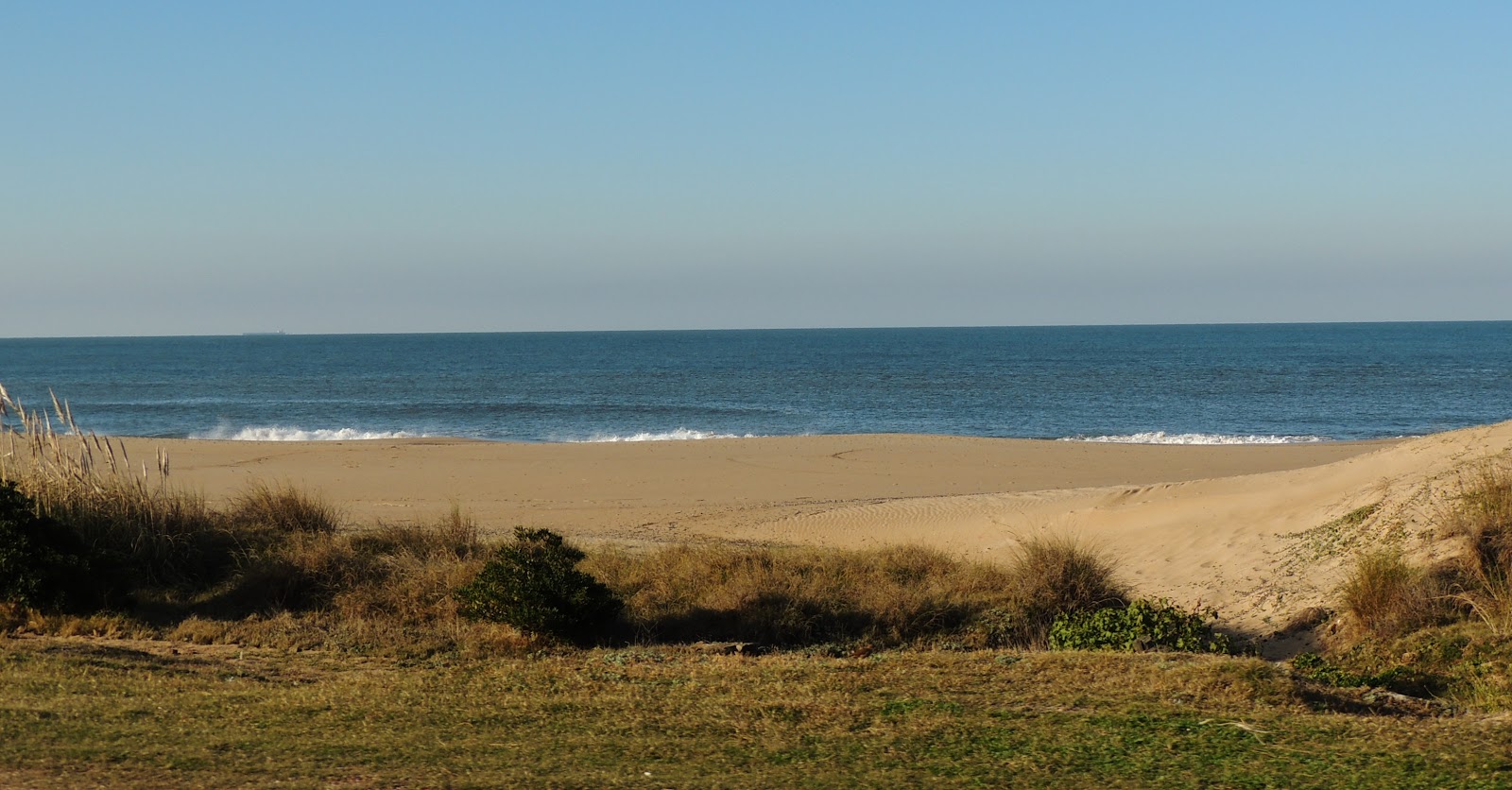 Zdjęcie Balneario Buenos Aires Beach z powierzchnią beżowy piasek