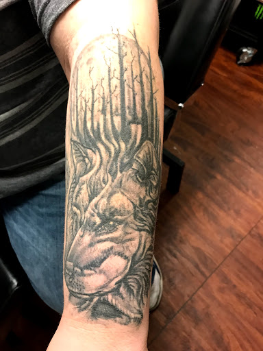 Explore father and son tattoos ideas, creative tattoo ideas in Seymour, available at American Gypsy Tattoo Corp.