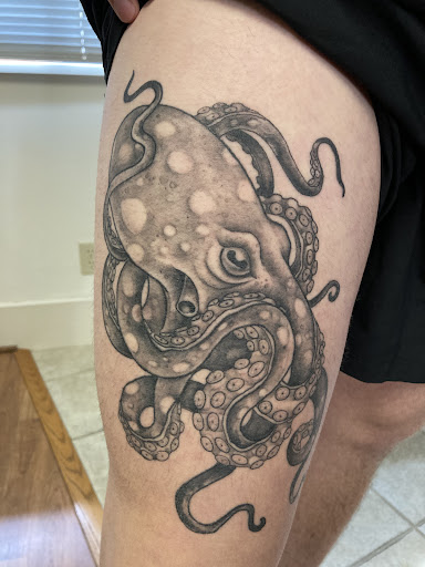 Explore silver lining tattoo ideas, creative tattoo ideas in Bothell, available at Hometown Tattoo