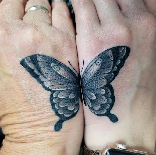 Explore fish tattoo ideas for females, creative tattoo ideas in North Fort Myers, available at Loyal 2 The Coil Tattoos & Body Piercings