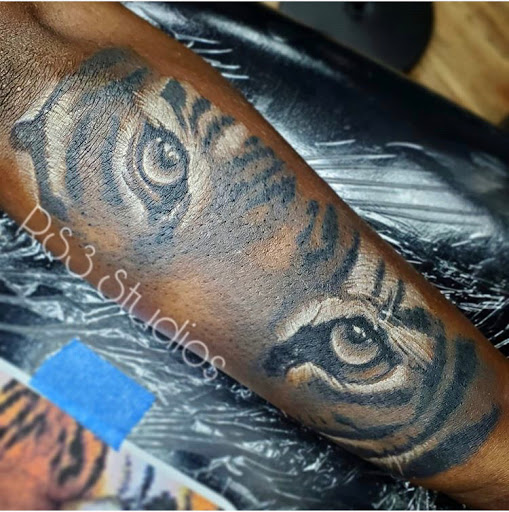 Explore neck tattoos ideas male, creative tattoo ideas in Houston, available at RS3 Studios