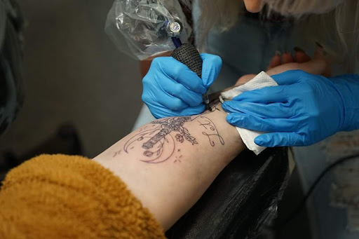 Explore rose foot tattoo ideas, creative tattoo ideas in Worcester, available at Unholy Grail Tattoo Inc