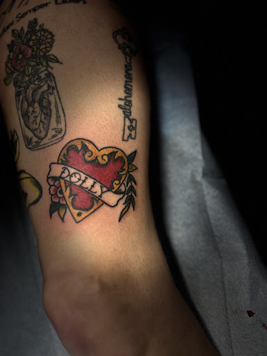 Explore hand tattoos ideas for men, creative tattoo ideas in Buckhannon, available at Good Times Tattoo Studio
