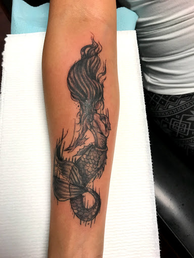 Explore lamb of god tattoo ideas, creative tattoo ideas in Seymour, available at American Gypsy Tattoo Corp.