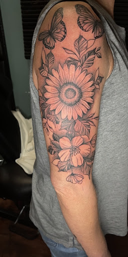 Explore bike tattoo ideas, creative tattoo ideas in Somerset, available at Benny binnu tattoo