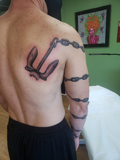 Explore skull and rose tattoo ideas, creative tattoo ideas in Fernley, available at Speakeasy Tattoo Co.