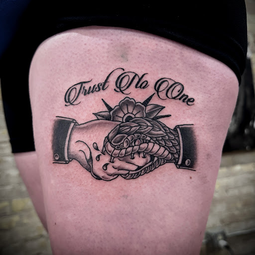 Explore wrist cross tattoo ideas, creative tattoo ideas in Dillon, available at Lacuna Studios