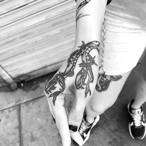 Explore twin tattoo ideas, creative tattoo ideas in Los Angeles, available at Chaotic tattoos