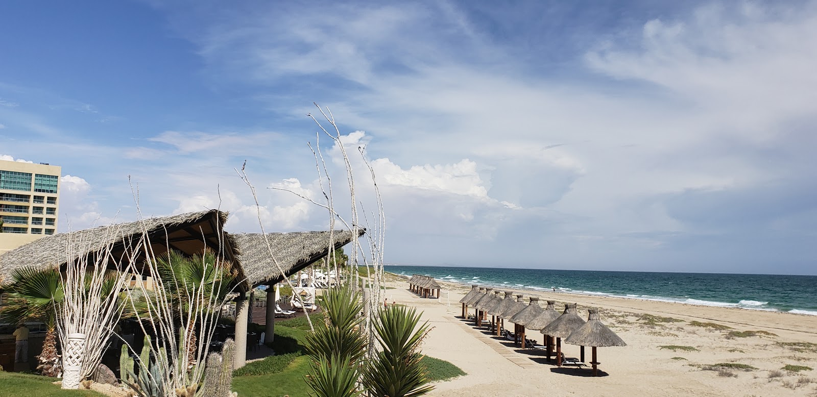 Foto di Playa Mayan con costa lunga e dritta