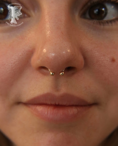 Explore cover up tattoo ideas on hip, creative tattoo ideas in Chicago, available at Fundamental Body Piercing