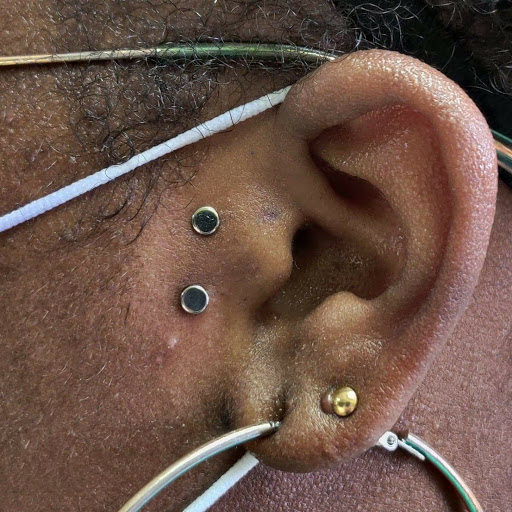 Explore barbed wire tattoo ideas, creative tattoo ideas in Romulus, available at Urban Rituals Piercing and Tattoo