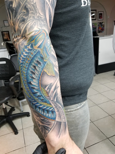 Explore first daughter tattoo ideas, creative tattoo ideas in Chicago, available at Royal Flesh Tattoo and Piercing