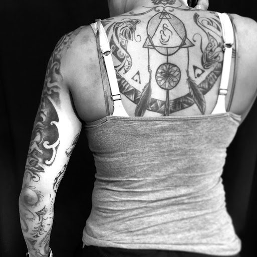 Explore butterfly leg tattoo ideas, creative tattoo ideas in Scarsdale, available at Damm Nice Tattoo & Body Art