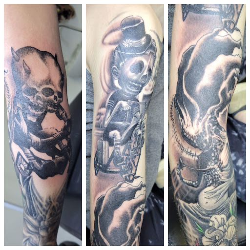 Explore viking sleeve tattoo ideas, creative tattoo ideas in Angola, available at Hoodlum Ink