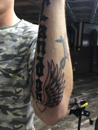 Explore 911 tattoo ideas, creative tattoo ideas in Independence, available at The Loft Tattoo Studio