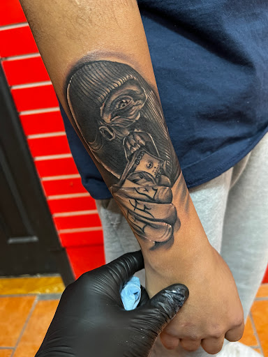 Find angel hand tattoo ideas for your next unique tattoo in El Paso at Estilo Firme Tattoo Co.