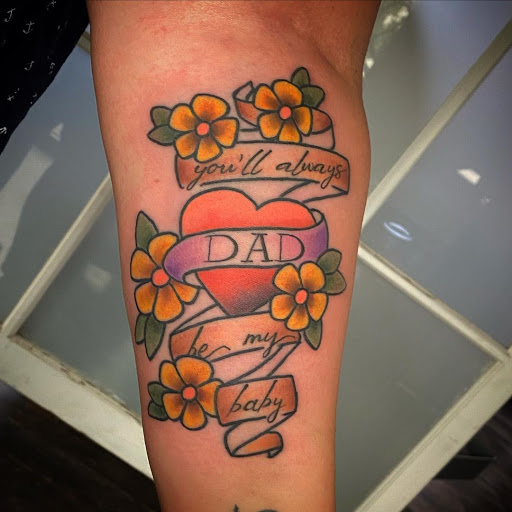 Explore muscle tattoo ideas, creative tattoo ideas in Spokane, available at Moms Custom Tattoo & Body Piercing