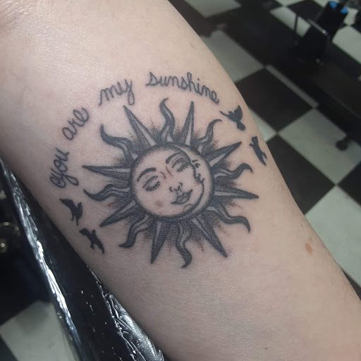 Explore racoon tattoo ideas, creative tattoo ideas in Medina, available at Art In Motion Inc Tattooing